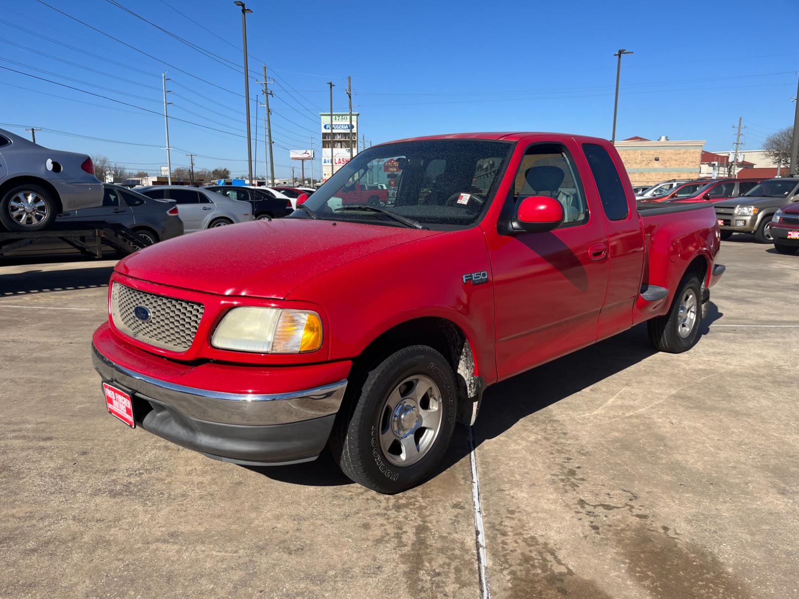 2003 red /TAN Ford F-150 XL SuperCab Flareside 2WD (1FTRX07213K) with an 4.2L V6 OHV 12V engine, Automatic transmission, located at 14700 Tomball Parkway 249, Houston, TX, 77086, (281) 444-2200, 29.928619, -95.504074 - Photo #2